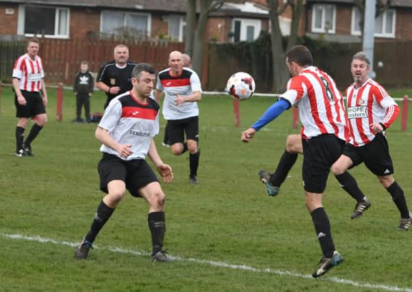 Over-40s League action as Ryhope Foresters (red/white) take on Redhouse WMC last week. Picture by Kevin Brady