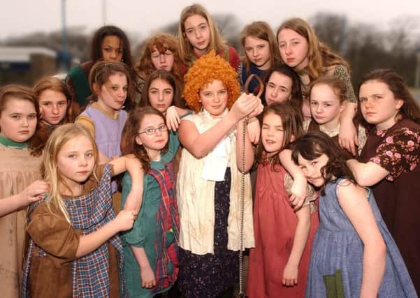 The cast of Annie in 2005.