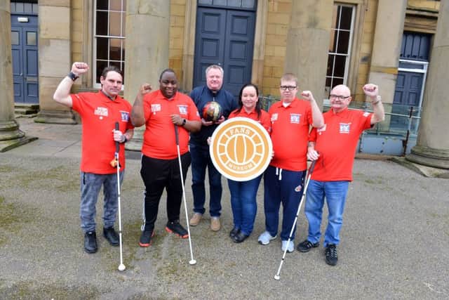 Founder of SAFC Museum Michael Ganley (middle) sponsors the partially sighted bowling team the Sunderland Spinners.
Team from left with new shirts Martin Whales, Tendai Noel, spotter Kathryn Murphey,  Alex Ditch and Dennis Murphey