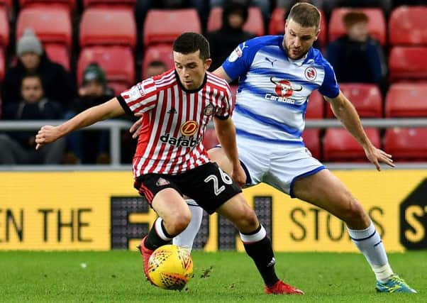 Sunderland's George Honeyman keeps possession in December's home clash with Reading, which the Royals won 3-1. Picture by Frank Reid