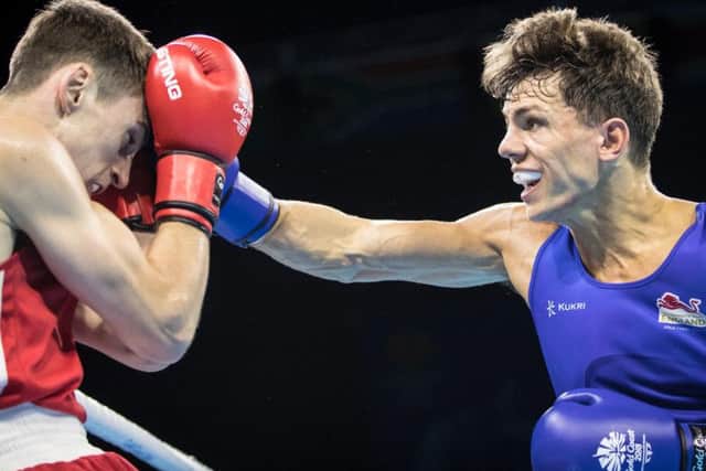 Pat McCormack lands a blow during his gold medal-winning bout. Danny Lawson/PA Wire.