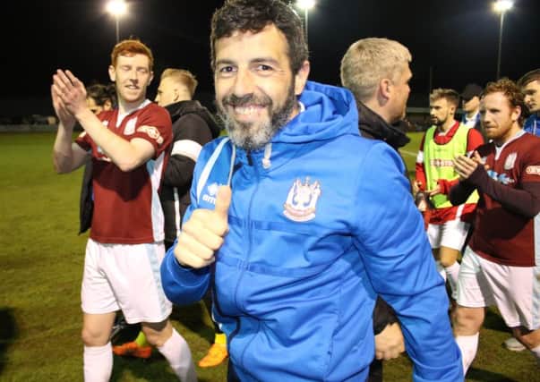 Thumbs up as Julio Arca celebrates South Shields' promotion last night. Picture by Peter Talbot