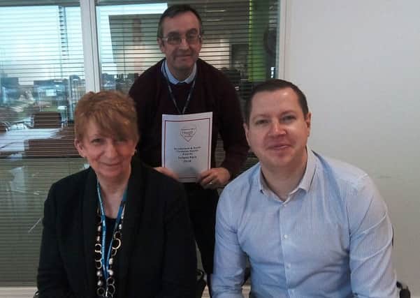 Carol Harries, left, Chris Cordner, centre, and Gavin Foster, right, at the judging of the Best of Health Awards.