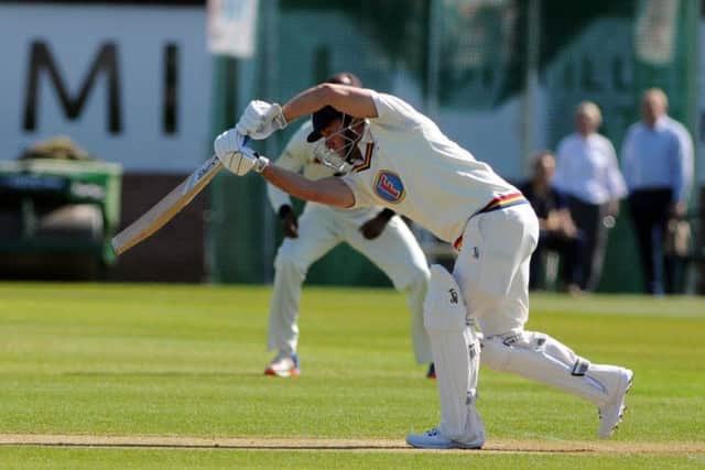 Will Smith struggles early on for Durham against Kent. Picture by Stu Norton