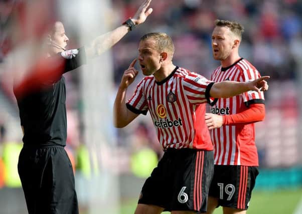 Lee Cattermole faces the assistant referee after a late goal is ruled out.