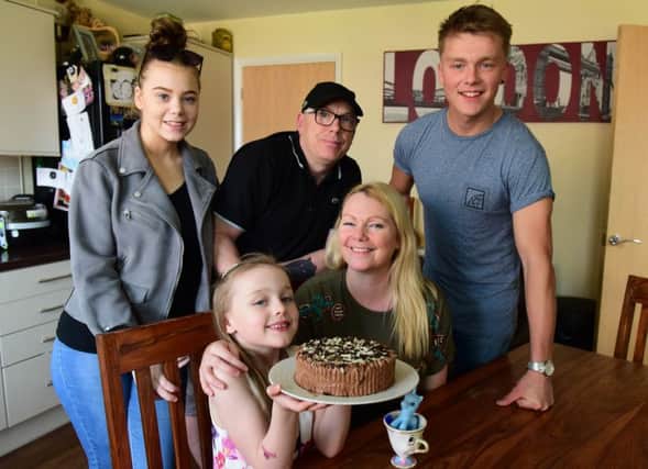 Six-year-old Summer Green, of Hayton Close, Southwick, Sunderland, who has invited The Queen to her birthday party later this year. Summer is pictured wth dad Stephen, mum Christina, sister Carlie and brother Stephen