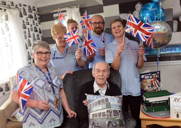 Springfield House resident Tom Stainsby celebrates 100th birthday with staff