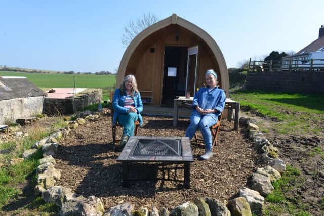 Ellin Hare and Nichola Balfour outside one of the new pods at The Barn at Easington.