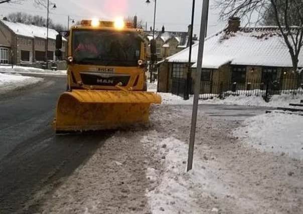 A Sunderland City Council snow plough clearing the road.