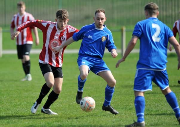 Sunderland West End (red/white) take on Stokesley last weekend. Picture by Kevin Brady