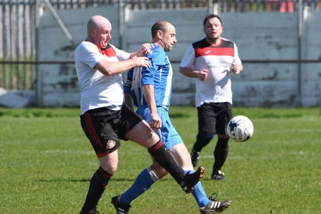 Redhouse WMC (white) take on Hartlepool Workies at the Billy Hardy Complex last weekend. Picture by Tim Richardson