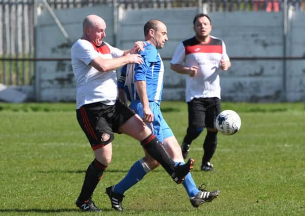 Redhouse WMC (white) take on Hartlepool Workies at the Billy Hardy Complex last weekend. Picture by Tim Richardson