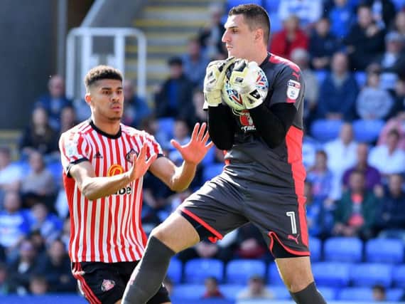 Vito Mannone in action for Reading after he left Sunderland last summer.