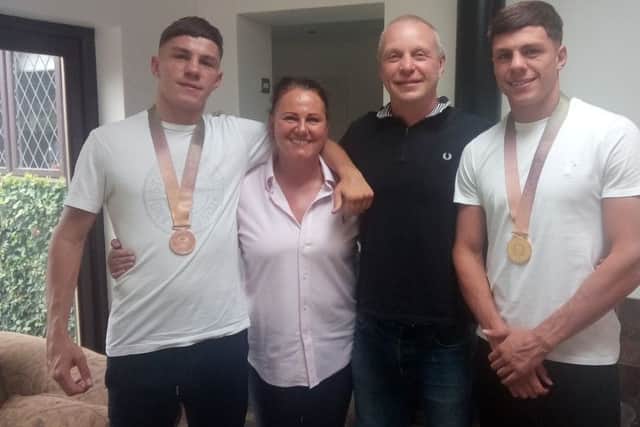 Luke (left) and Pat McCormack with mum Michelle and dad Martin