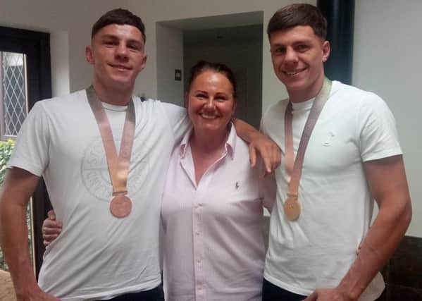 Luke (left) and Pat McCormack with mum Michelle