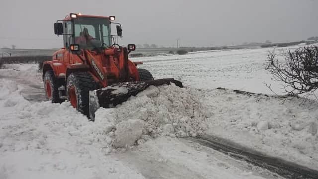 Sunderland City Council snow-clearing underway in Burdon Lane during the Beast from the East