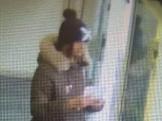 A woman police would like to speak to in connection with a theft.