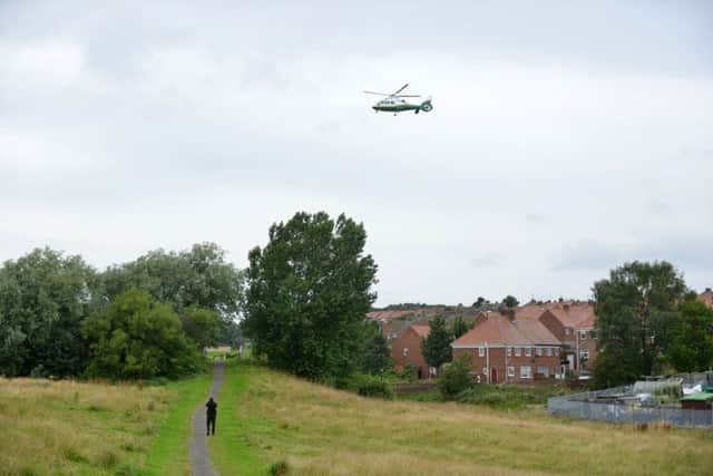 The Great North Air Ambulance leaving the scene in Rosslyn Avenue following the explosion.