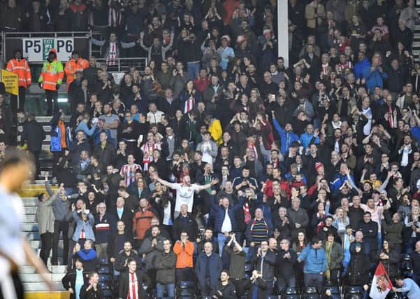 Sunderland fans celebrate Joel Asoro's opener at Fulham tonight. Picture by Frank Reid