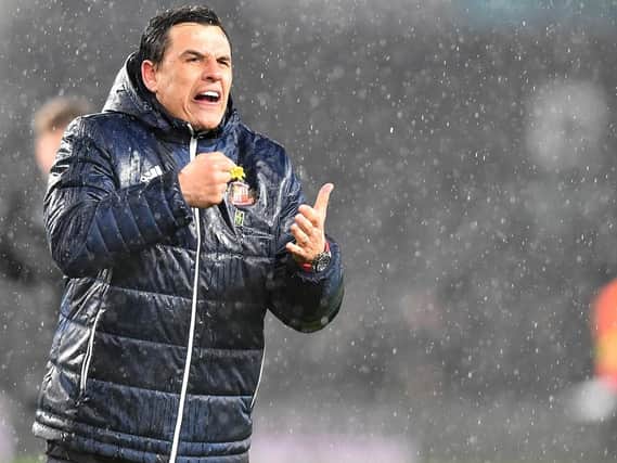 Chris Coleman celebrates a Sunderland win over Derby County
