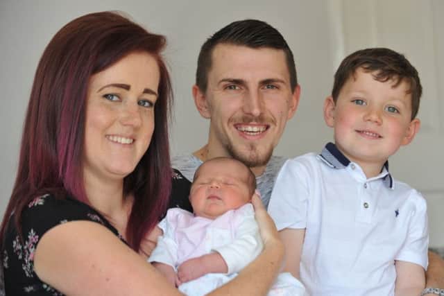 Janine Springthorpe and Anth Bewick with daughter Scarlett Lily, who was delivered in the car park of Sunderland Royal Hospital, with brother Kayden.