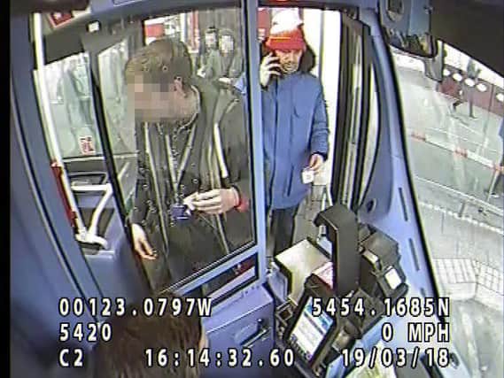 CCTV image of a man police want to speak to in connection with an assault on a bus at Park Lane interchange