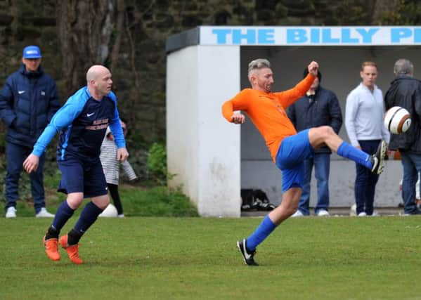 Ironside Cup Final action as  Plains Farm Alldec Over-40s (blue) take on South Shields Catholic Club. Picture by Tim Richardson.