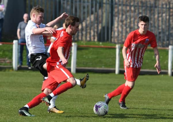 Seaham Red Star (red/white) take on West Auckland in their recent meeting.