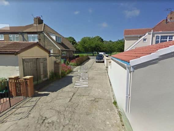 The man said he was walking along Wraith Terrace when he was robbed. Image copyright Google Maps.