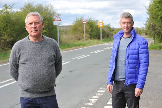 Residents Mick Smith, left, and Graham Ivison, campaigning for a pavement along Moor Lane, Cleadon.
