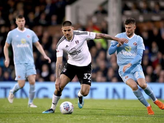 Ethan Robson (right) with Aleksandar Mitrovic, of Fulham.