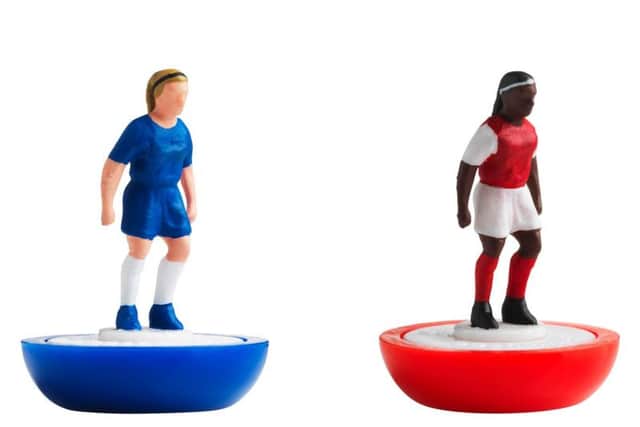 Figures in the colours of Chelsea (left) and Arsenal from the first all-female Subbuteo set, which has been launched to reflect the rapid growth of women's football in the UK. 

The FA and the game's maker, Hasbro, revealed the limited edition version of the table football game ahead of the SSE Women's FA Cup final at Wembley Stadium on May 5, with the figures wearing the colours of finalists Arsenal and Chelsea