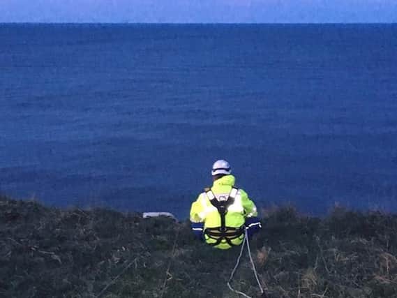 A rope rescue being carried out on cliffs off Shippersea Bay.
