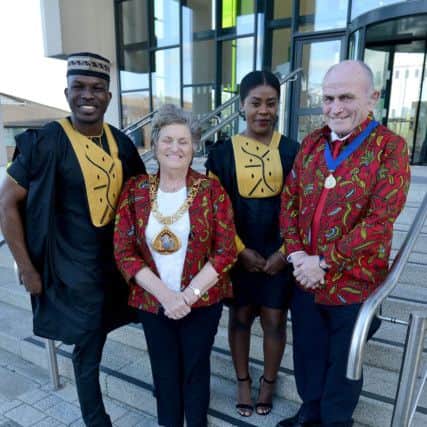 Afrio-Caribbean Society president Francis Ezenagu and member Elvica Kata welcome the Mayor of Sunderland Doris MacKnight along with her consort and husband Keith to the battle of the tribes event held by the Afro-Caribbean Society at Sunderland University.