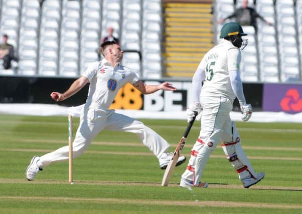 Nathan Rimmington races in to bowl for Durham against Leicestershire today. Picture by Stu Norton