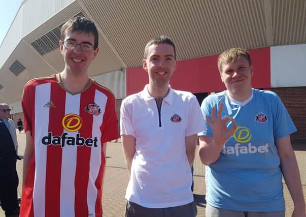 From left to right, supporters Andrew Jenks, Daniel Jenks and Michael Bowers are hoping for a brighter future for the Black Cats.