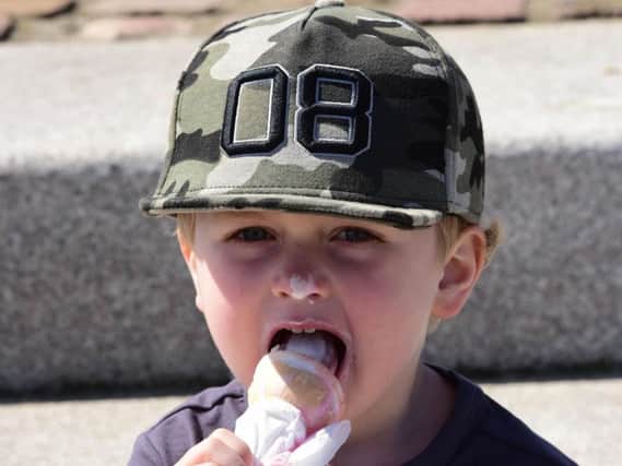 Jacob Jarrett, aged three, from Kent, enjoys an ice cream during a visit to the North East over the weekend.