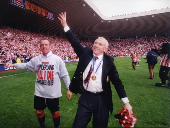 Kevin Ball and Peter Reid celebrate.