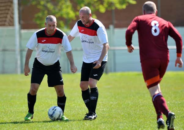 Redhouse WMC (white) plot a move against Easington Colliery CIU last weekend. Picture by Tim Richardson