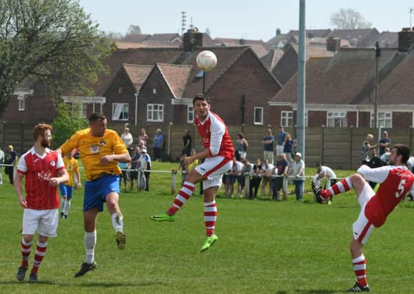 Silksworth CW (red/white) take on Wearside League rivals Sunderland West End (yellow) in Monday's TWR Shipowners' Charity Cup final. Picture by Kevin Brady
