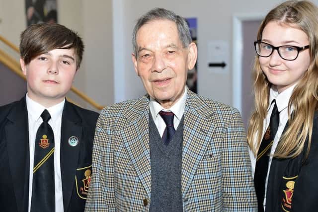 Holocaust survivor Rudi Oppenheimer with Southmoor Academy Year 8 students Michael Colquhoan and Ruby Lynn.