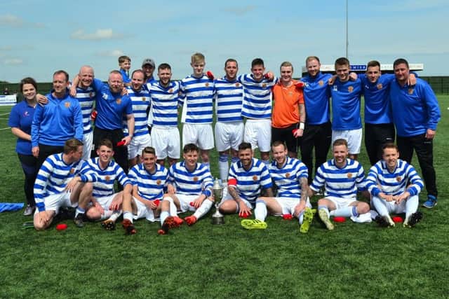 Chester-le-Street Town celebrate after their 2-0 Ernest Armstrong Memorial Cup final win over Ryton & Crawcrook Albion at Consett. Pic: Gary Welford.