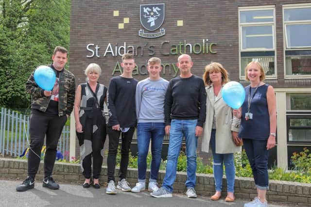 Mitchell Miller, Jayne Alcock, Liam Alcock, Bradley Allan, Steven Alcock, Sandra Wilson, Bernadette Foreman at St Aidan's Catholic Academy for a balloon release to honour student Kyle Alcock who passed away as well as teaching assistant Sylvia Addison.
Picture by Tom Banks