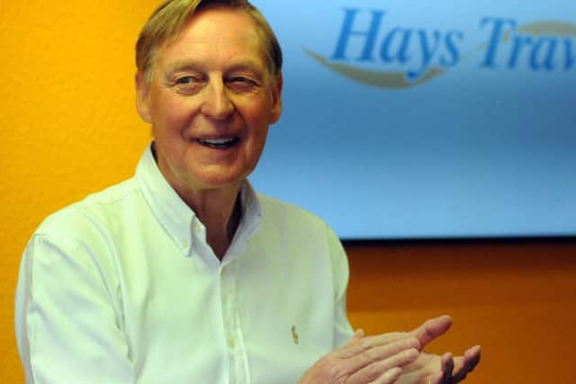 John Hays announcement of firm Hays Travel Â£1billion turnover and staff bonus