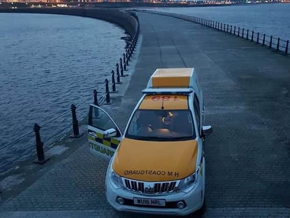 The Coastguard team on the scene in a picture posted by the service via Facebook.