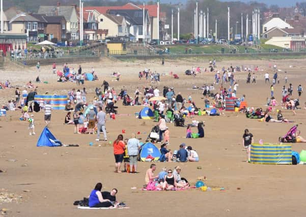 People taking advanatge of the glorious Bank Holiday weather on the beach at Seaburn.