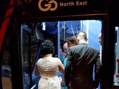 Kayleigh and Colin Thompson getting on the Number 60 bus following their wedding.