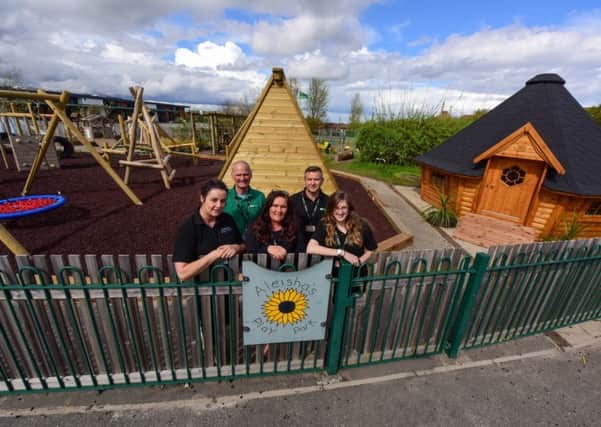Staff at The Ribbon School, Barnes Road, Murton in their nearly completed new play area. Pictured left to right are Lisa Walton, acting headteacher early years, Mark Dudley caretaker, Aleisha's mum and school administrator Michelle Ord, John Murray site manager and Rebecca Gent, deputy headteacher early years.