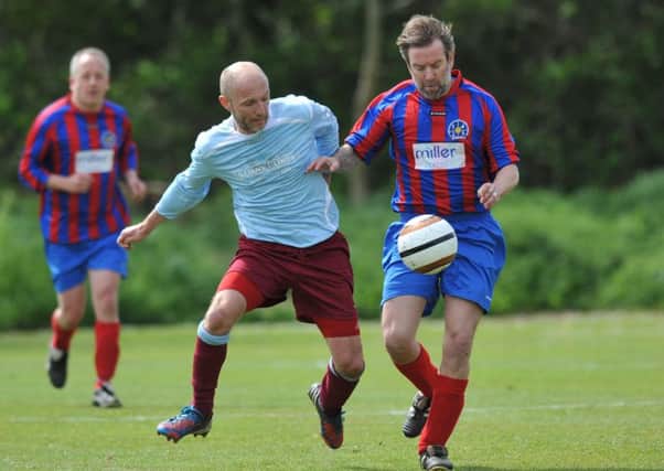 Billy Lorraine Over-40s Cup Final action as Wearmouth CW Old Boys (light blue) take on Sedgefield last week. Picture by Tim Richardson