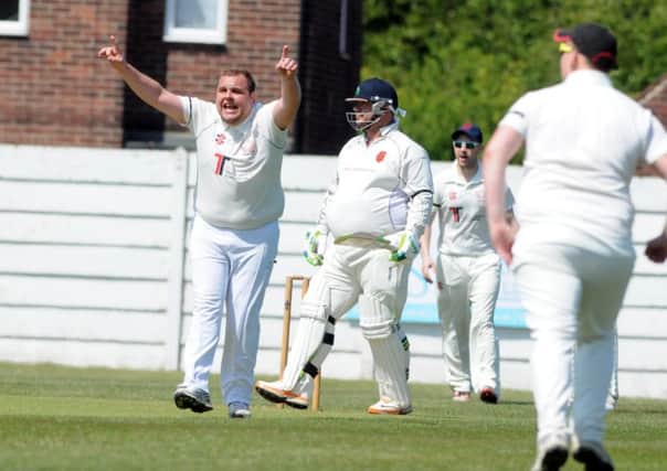 Hylton bowler Adam Bewick claims a wicket against Dawdon on Saturday. Picture by Stu Norton